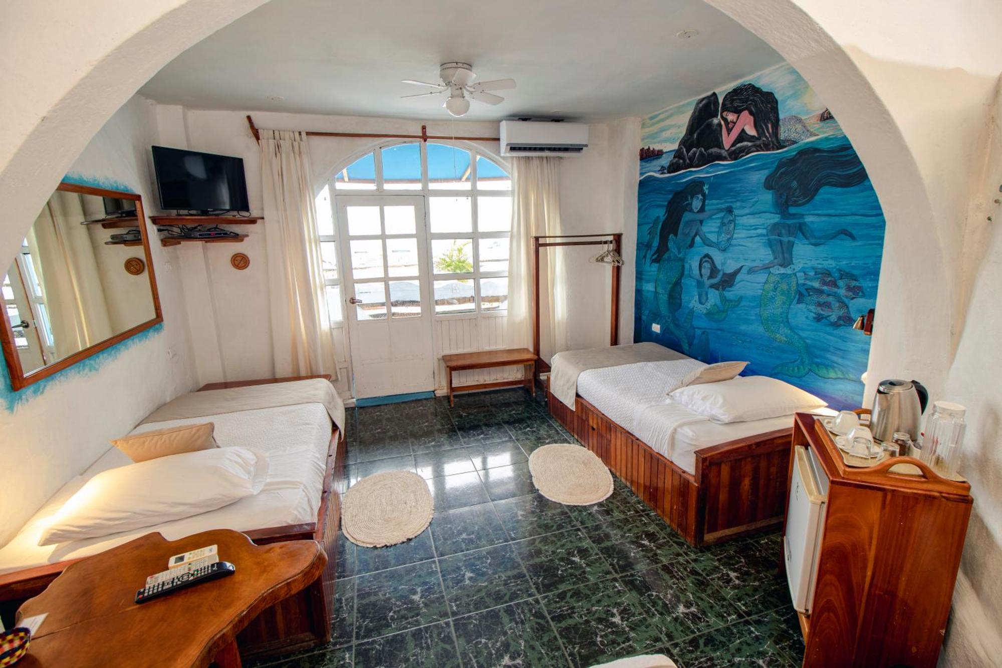 Hotel Casa Blanca بويرتو بكويريزو مورينو الغرفة الصورة